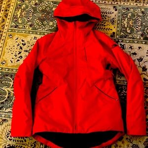 North face ski jacket with zip out inner layer. Very warm.